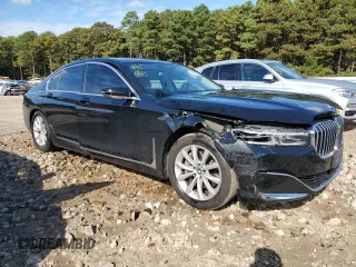 2021 BMW 7 Series 740i xDrive with VIN WBA7T4C01MCF84387, listed as a Copart auction lot 71606223 with 28,283 mi miles. Bid and sale history available at carsss.com. Image 4.