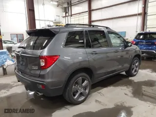 2019 Honda Passport Touring with VIN 5FNYF8H98KB007933, listed as a IAAI auction lot 41953263 with 87,614 mi miles. Bid and sale history available at carsss.com. Image 4.