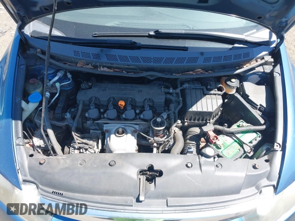 2006 Honda Civic LX with VIN JHMFA16586S000128, listed as a IAAI auction lot 42138350 with 127,253 mi miles and . Bid and sale history available at DreamBid. Image 10.