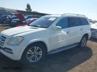 2011 Mercedes-Benz GL-Class GL 550 with VIN 4JGBF8GE7BA749183, listed as a IAAI auction lot 41626371 with 132,215 mi miles. Bid and sale history available at carsss.com. Image 2.