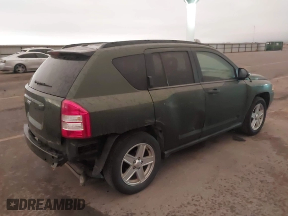 2007 Jeep Compass Sport with VIN 1J8FT47W77D221755, listed as a IAAI auction lot 41826458 with 205,072 mi miles. Bid and sale history available at carsss.com. Image 4.