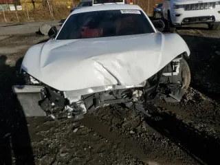 2018 Audi R8 V10 z VIN WUABAAFX5J7902445, wystawiony jako Copart lot #80124934 z przebiegiem Nie podano mil oraz Szkody całkowita. Historia ofert i sprzedaży dostępna na DreamBid. Obrazek 5.