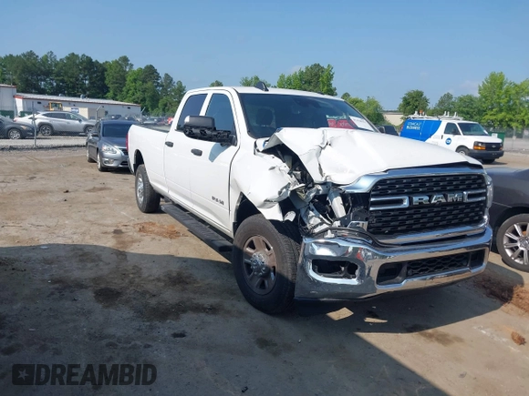 2022 Ram 2500 Tradesman with VIN 3C6UR4HJ2NG208791, listed as a IAAI auction lot 42428957 with 70,960 mi miles and . Bid and sale history available at DreamBid. Image 1.