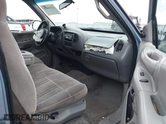 1998 Ford F-150 with VIN 1FTZX1762WKB76211, listed as a IAAI auction lot 41518425 with 265,987 mi miles and . Bid and sale history available at DreamBid. Image 5.