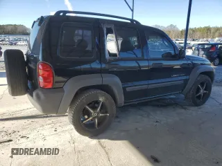 2003 Jeep Liberty Sport with VIN 1J4FK481X3W725304, listed as a Copart auction lot 87003384 with 185,646 mi miles and Salvage Title. Bid and sale history available at DreamBid. Image 3.