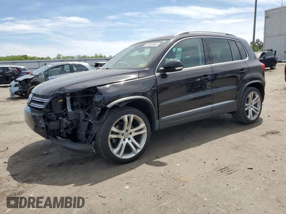 2013 Volkswagen Tiguan SE z VIN WVGAV7AX4DW523112, wystawiony jako Copart lot #53261855 z przebiegiem 86 190 mil mil oraz Szkoda całkowita • Salvage title. Historia ofert i sprzedaży dostępna na DreamBid. Obrazek 1.
