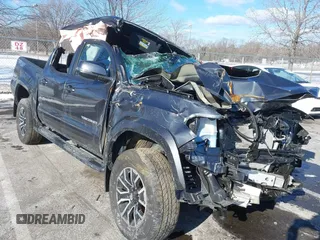 2023 Toyota Tacoma SR with VIN 3TMCZ5AN9PM574534, listed as a IAAI auction lot 41167910 with 27,375 mi miles and . Bid and sale history available at DreamBid. Image 6.