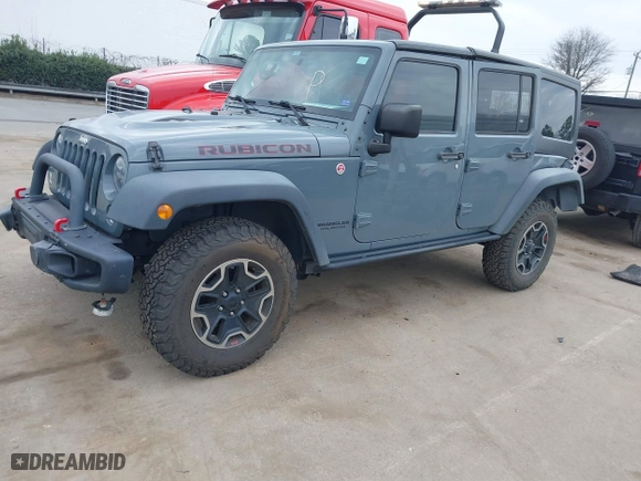 2015 Jeep Wrangler Unlimited Rubicon Hard Rock with VIN 1C4HJWFG1FL679873, listed as a IAAI auction lot 41508722 with 97,165 mi miles. Bid and sale history available at carsss.com. Image 2.