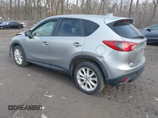 2013 Mazda CX-5 Grand Touring with VIN JM3KE4DE2D0115154, listed as a IAAI auction lot 41706007 with 153,532 mi miles. Bid and sale history available at carsss.com. Image 3.