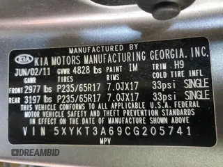 2012 Kia Sorento LX with VIN 5XYKT3A69CG205741, listed as a Copart auction lot 54657155 with 178,794 mi miles and Salvage Title. Bid and sale history available at DreamBid. Image 13.