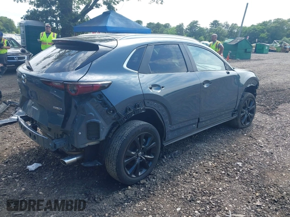 2023 Mazda CX-30 S Preferred z VIN 3MVDMBCM4PM558181, wystawiony jako IAAI lot #42589333 z przebiegiem 12 384 mil mil oraz . Historia ofert i sprzedaży dostępna na DreamBid. Obrazek 4.