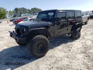 2013 Jeep Wrangler Unlimited Moab with VIN 1C4HJWEG7DL600043, listed as a Copart auction lot 52146945 with 118,882 mi miles and Salvage title. Bid and sale history available at DreamBid. Image 1.