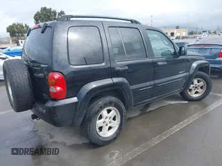 2004 Jeep Liberty Limited with VIN 1J4GL58K14W184032, listed as a IAAI auction lot 41814355 with 276,413 mi miles. Bid and sale history available at carsss.com. Image 4.