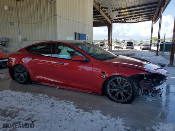 2022 Tesla Model S Plaid with VIN 5YJSA1E64NF473840, listed as a Copart auction lot 67347174 with 52,657 mi miles and Non Repairable. Bid and sale history available at carsss.com. Image 4.