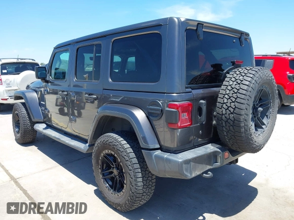 2018 Jeep Wrangler Unlimited Sahara with VIN 1C4HJXEN1JW236779, listed as a IAAI auction lot 42238158 with 72,879 mi miles and . Bid and sale history available at DreamBid. Image 3.