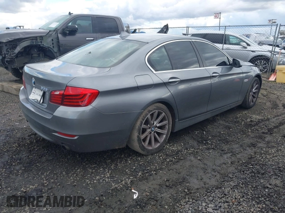 2014 BMW 5 Series 535i with VIN WBA5B1C51ED475098, listed as a IAAI auction lot 41517762 with 102,611 mi miles and . Bid and sale history available at carsss.com. Image 4.
