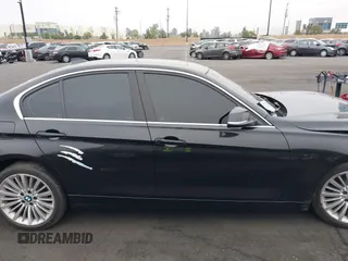 2014 BMW 3 Series 328i xDrive with VIN WBA3B5C51EP543364, listed as a IAAI auction lot 42138365 with 145,243 mi miles and . Bid and sale history available at DreamBid. Image 14.