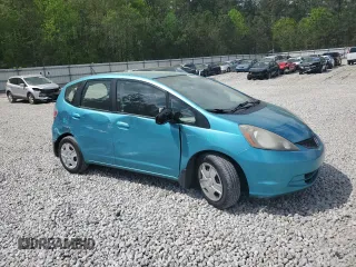 2013 Honda Fit with VIN JHMGE8H39DC019758, listed as a Copart auction lot 51323995 with 148,321 mi miles and Salvage Title. Bid and sale history available at carsss.com. Image 4.