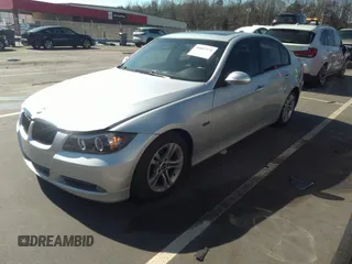 2008 BMW 3 Series 328i with VIN WBAVA37588NL53989, listed as a IAAI auction lot 38807371 with 179,844 mi miles. Bid and sale history available at carsss.com. Image 2.
