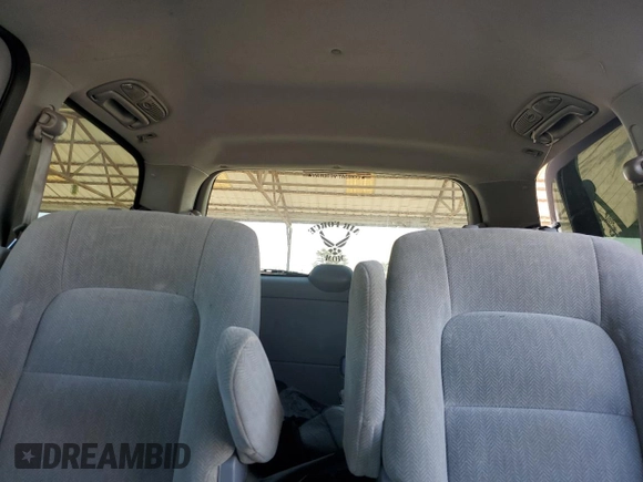 2005 Kia Sedona LX with VIN KNDUP132056683645, listed as a Copart auction lot 86584104 with 0 mi miles and Salvage Title. Bid and sale history available at carsss.com. Image 10.