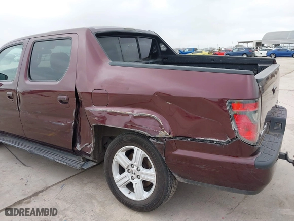 2014 Honda Ridgeline RTL with VIN 5FPYK1F52EB010700, listed as a IAAI auction lot 41490401 with 180,947 mi miles. Bid and sale history available at carsss.com. Image 17.