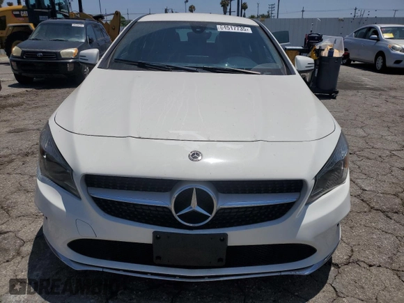 2019 Mercedes-Benz CLA 250 with VIN WDDSJ4EB6KN749419, listed as a Copart auction lot 64517735 with 73,323 mi miles and Salvage title. Bid and sale history available at DreamBid. Image 5.
