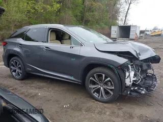 2021 Lexus RX 450h with VIN 2T2HGMDA7MC058171, listed as a IAAI auction lot 42172195 with 42,255 mi miles and . Bid and sale history available at DreamBid. Image 14.
