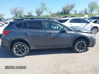2021 Subaru Crosstrek Premium z VIN JF2GTAEC4M8279380, wystawiony jako IAAI lot #42181035 z przebiegiem 86 982 mil mil oraz . Historia ofert i sprzedaży dostępna na DreamBid. Obrazek 14.