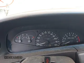 2002 Ford Escort ZX2 Standard z VIN 3FAFP11382R230057, wystawiony jako IAAI lot #42338923 z przebiegiem 111 587 mil mil oraz . Historia ofert i sprzedaży dostępna na DreamBid. Obrazek 7.