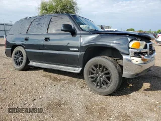 2000 GMC Yukon SLT with VIN 1GKEK13T3YJ202112, listed as a Copart auction lot 71713084 with 303,866 mi miles and Salvage Title. Bid and sale history available at carsss.com. Image 4.