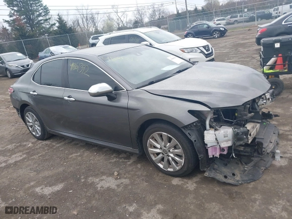 2020 Toyota Camry LE with VIN 4T1C11AK0LU400052, listed as a IAAI auction lot 41861392 with 71,213 mi miles. Bid and sale history available at carsss.com. Image 1.