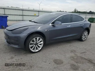 2018 Tesla Model 3 Long Range Battery z VIN 5YJ3E1EA1JF163099, wystawiony jako Copart lot #53869455 z przebiegiem 106 582 mil mil oraz Szkoda całkowita • Salvage title. Historia ofert i sprzedaży dostępna na DreamBid. Obrazek 1.