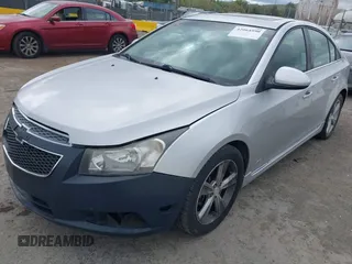 2012 Chevrolet Cruze LT w/2LT with VIN 1G1PG5SC4C7284915, listed as a IAAI auction lot 42064590 with 143,418 mi miles. Bid and sale history available at carsss.com. Image 2.