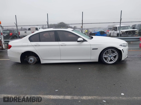 2014 BMW 5 Series 535d with VIN WBAXA5C58ED690612, listed as a IAAI auction lot 41570616 with 95,124 mi miles and . Bid and sale history available at carsss.com. Image 14.