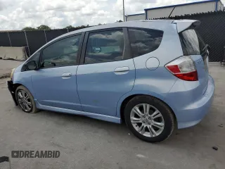 2010 Honda Fit Sport with VIN JHMGE8H64AC032634, listed as a Copart auction lot 61795825 with 143,593 mi miles and Salvage title. Bid and sale history available at DreamBid. Image 2.
