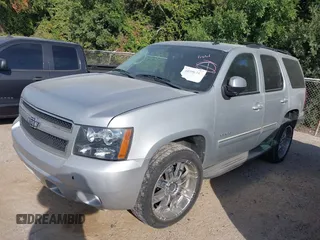 2011 Chevrolet Tahoe LS with VIN 1GNSCAE00BR140716, listed as a IAAI auction lot 40225018 with 189,052 mi miles and . Bid and sale history available at DreamBid. Image 2.