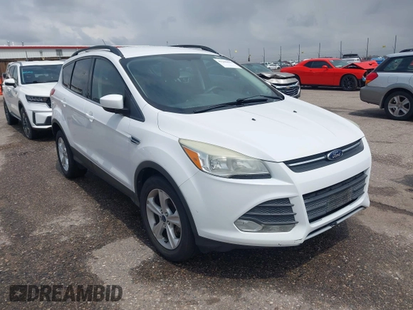 2014 Ford Escape SE with VIN 1FMCU9GX6EUD51032, listed as a IAAI auction lot 42206659 with 131,438 mi miles and . Bid and sale history available at DreamBid. Image 1.