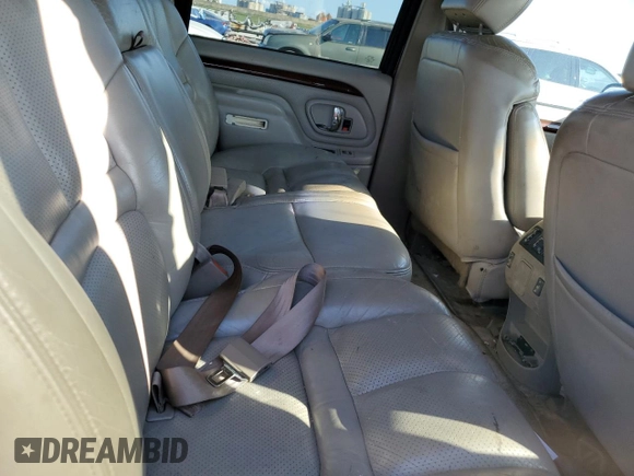 2000 Cadillac Escalade z VIN 1GYEK13R0YR167895, wystawiony jako Copart lot #82586443 z przebiegiem 267 099 mil mil oraz Szkoda całkowita • Salvage title. Historia ofert i sprzedaży dostępna na DreamBid. Obrazek 11.