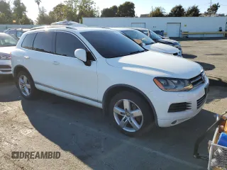 2012 Volkswagen Touareg Exec with VIN WVGEF9BP1CD010015, listed as a Copart auction lot 72646154 with 163,502 mi miles and Salvage Title. Bid and sale history available at DreamBid. Image 4.