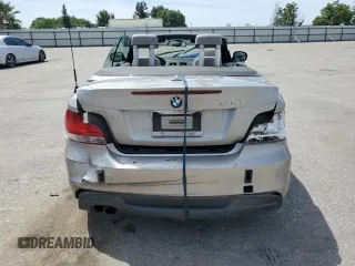 2010 BMW 1 Series 135i with VIN WBAUN9C55AVK41973, listed as a Copart auction lot 54609015 with 144,685 mi miles and Salvage Title. Bid and sale history available at carsss.com. Image 6.
