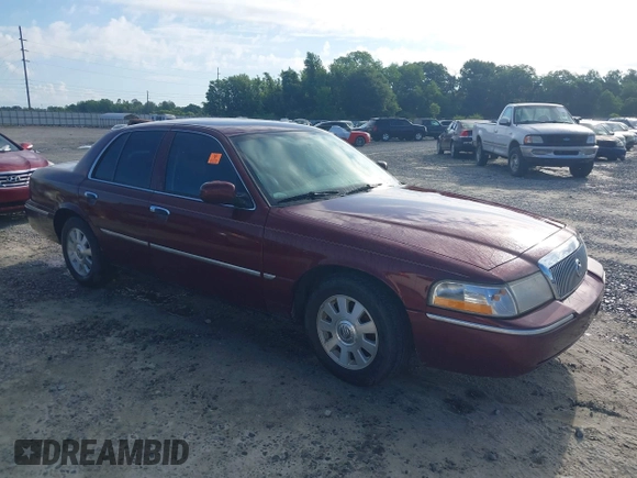 2004 Mercury Grand Marquis LS Premium z VIN 2MEFM75WX4X671041, wystawiony jako IAAI lot #42261517 z przebiegiem 107 182 mil mil oraz . Historia ofert i sprzedaży dostępna na DreamBid. Obrazek 1.