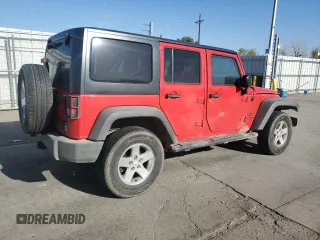 2015 Jeep Wrangler Unlimited Willys Wheeler with VIN 1C4BJWDG8FL574014, listed as a Copart auction lot 51921255 with 54,134 mi miles and Salvage Title. Bid and sale history available at DreamBid. Image 3.