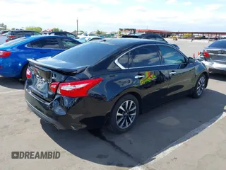 2016 Nissan Altima SR with VIN 1N4AL3AP6GC116956, listed as a IAAI auction lot 42068274 with 148,696 mi miles and . Bid and sale history available at DreamBid. Image 4.