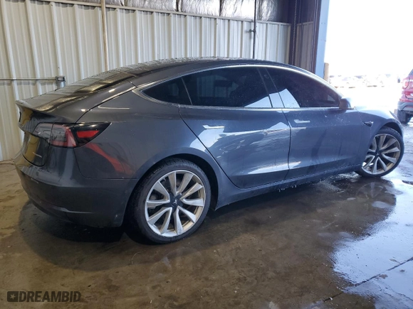 2019 Tesla Model 3 Long Range with VIN 5YJ3E1EB1KF389203, listed as a Copart auction lot 88483045 with 85,411 mi miles and Salvage Title. Bid and sale history available at carsss.com. Image 3.