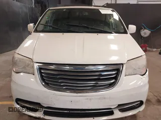 2013 Chrysler Town & Country Touring z VIN 2C4RC1BG9DR656630, wystawiony jako IAAI lot #42141980 z przebiegiem 150 303 mil mil oraz . Historia ofert i sprzedaży dostępna na DreamBid. Obrazek 12.