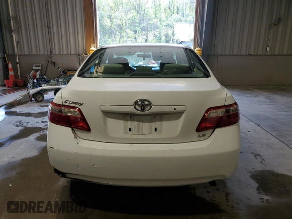 2009 Toyota Camry with VIN 4T1BE46K79U903337, listed as a Copart auction lot 54561145 with 252,622 mi miles and Salvage Title. Bid and sale history available at DreamBid. Image 6.