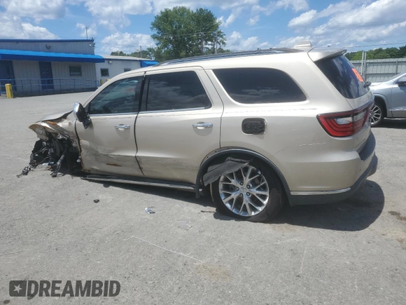 2015 Dodge Durango Citadel with VIN 1C4SDHET0FC873740, listed as a Copart auction lot 56067255 with 131,362 mi miles and Salvage title. Bid and sale history available at DreamBid. Image 2.