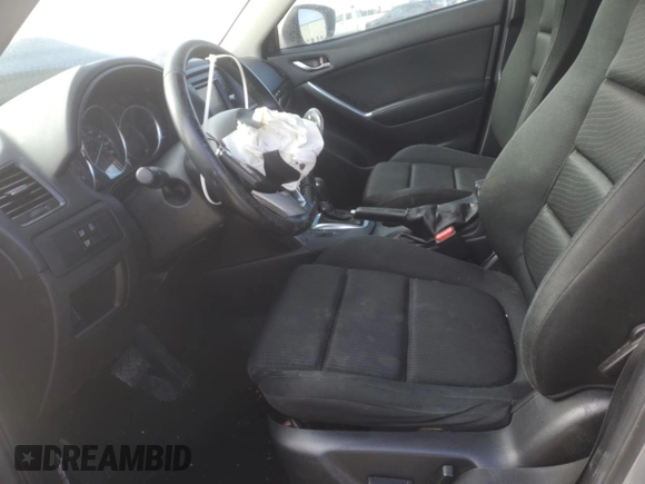 2015 Mazda CX-5 Touring with VIN JM3KE4CY4F0467571, listed as a Copart auction lot 88919035 with 197,755 mi miles and Salvage Title. Bid and sale history available at carsss.com. Image 7.