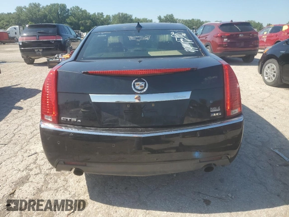 2011 Cadillac CTS Premium with VIN 1G6DS5ED4B0136612, listed as a Copart auction lot 63264925 with 199,928 mi miles and Salvage title. Bid and sale history available at DreamBid. Image 6.