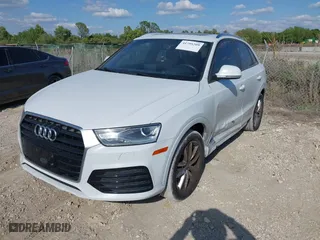 2018 Audi Q3 Premium with VIN WA1BCCFS6JR010047, listed as a IAAI auction lot 41795209 with 99,609 mi miles. Bid and sale history available at carsss.com. Image 17.